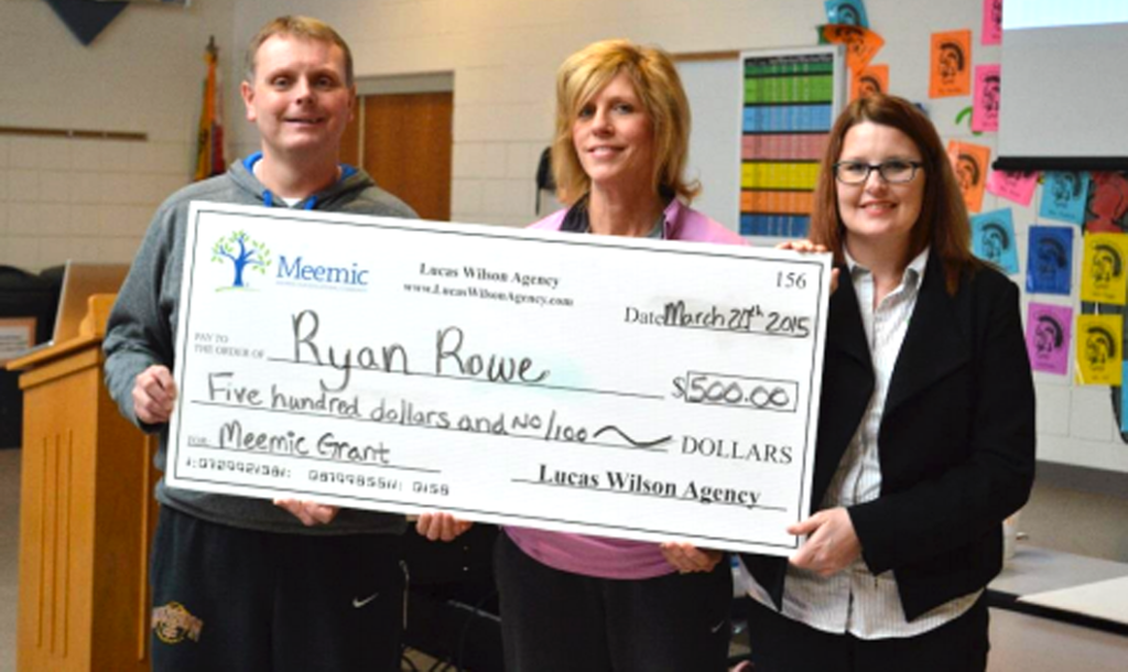 Photo: Jessica Wilson of the Lucas Wilson Agency and Meemic Foundation presents the grant check to elementary physical education teachers, Rick McNeil and Mary Anschuetz. Madison School District is located in Madison Township in Adrian, Michigan.